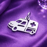 Belle Fever silver ambulance charm for keyring on violet satin, glossy medical vehicle pendant for EMT gift.