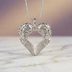 Belle Fever silver angel heart necklace, handcrafted symbolic jewellery representing love and protection