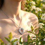 Belle Fever silver angel heart necklace worn by model elegant and symbolic jewellery, perfect for everyday wear or as a heartfelt gift, handmade in Australia with quality craftsmanship.