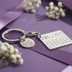 Calendar keyring with disc charm by Belle Fever featuring a custom wedding date, a timeless keepsake for anniversaries and special moments.