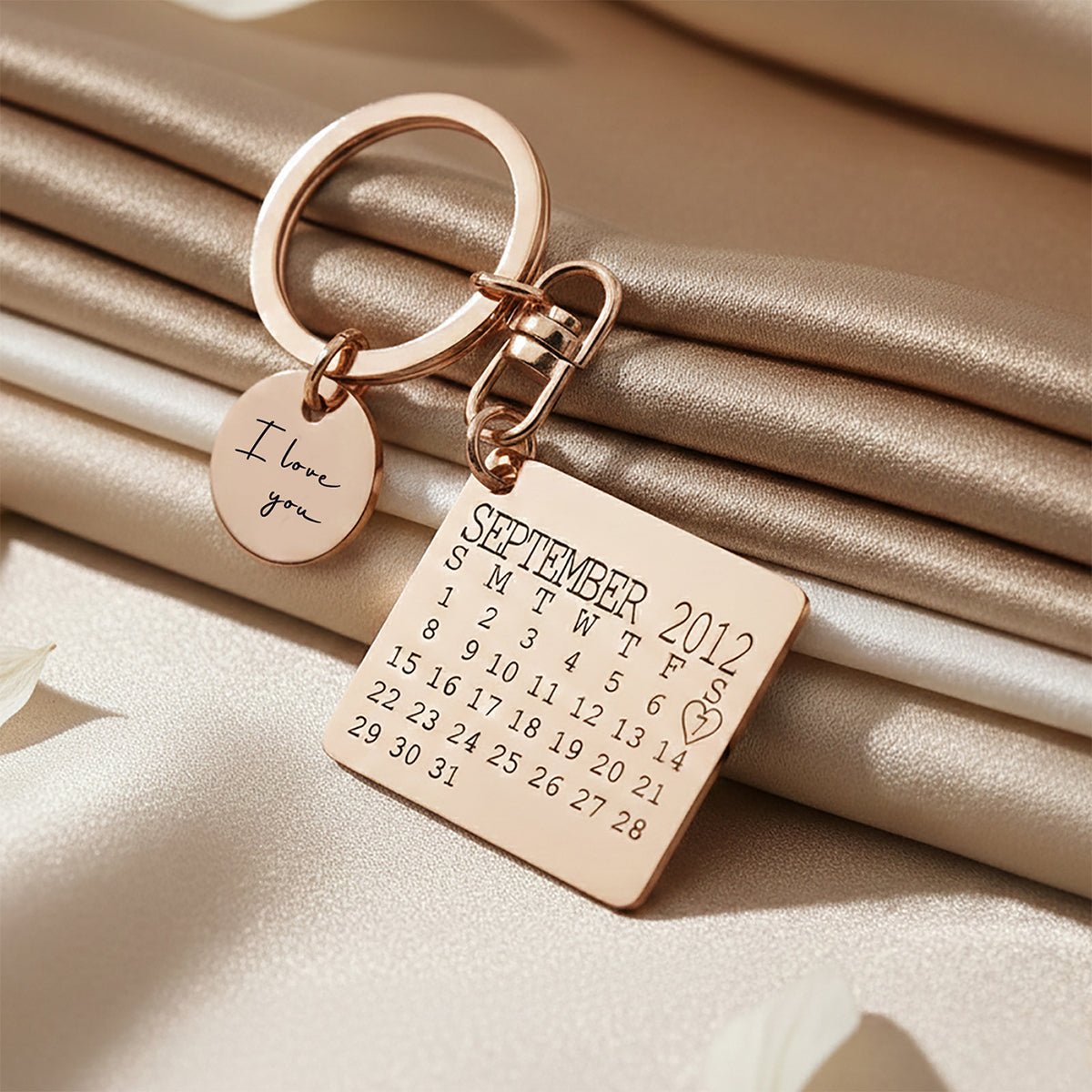 Romantic Belle Fever calendar keyring with disc charm engraved with your wedding date, a meaningful anniversary keepsake.