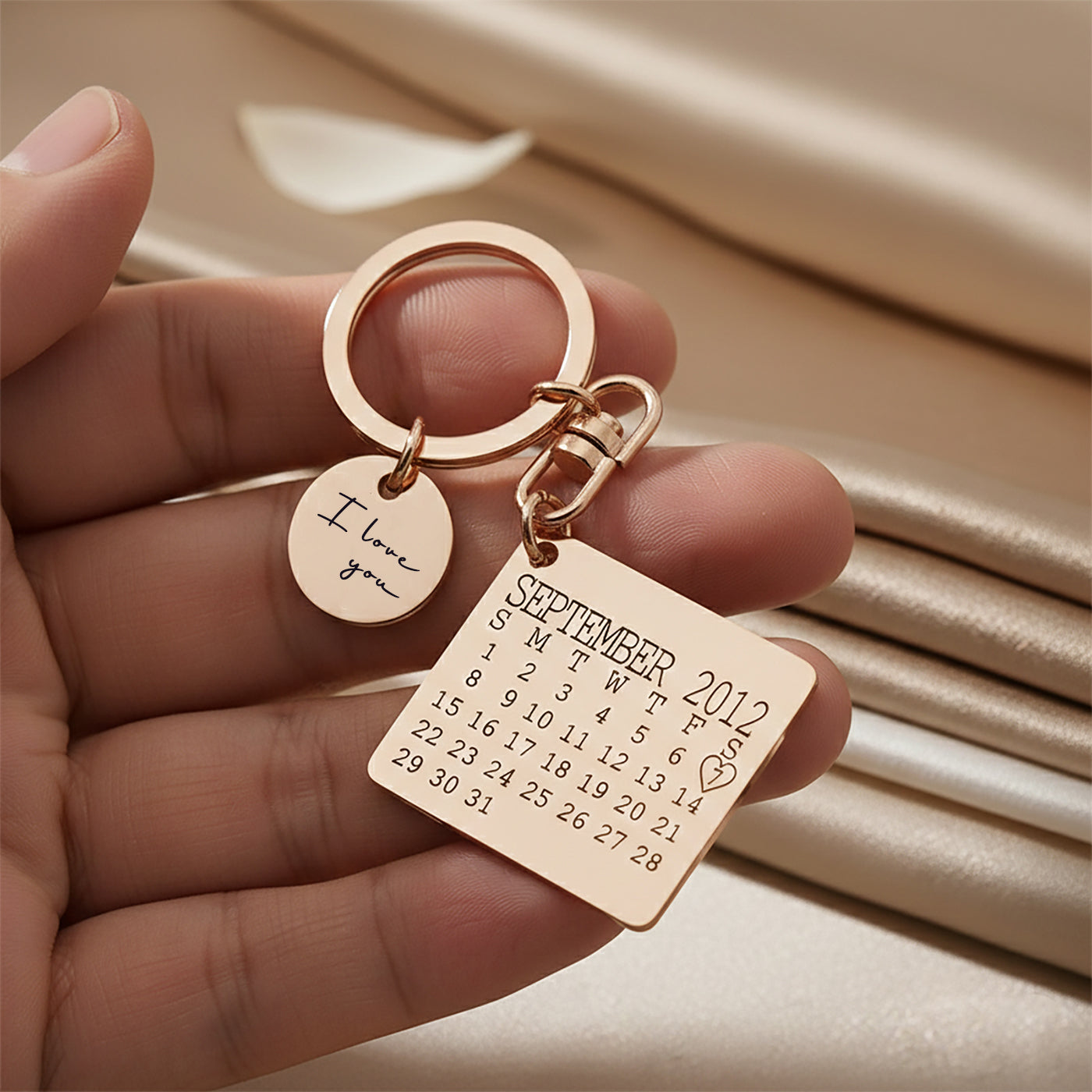 Romantic Belle Fever calendar keyring with disc charm engraved with your wedding date, a meaningful anniversary keepsake.