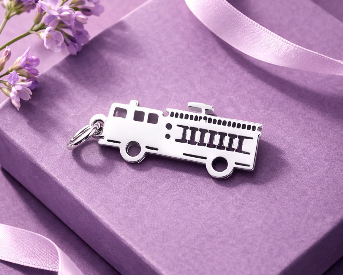 Belle Fever silver fire truck charm on lavender box with ribbon and flowers, personalised firefighter charm jewellery gift