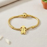 Belle Fever moments bracelet with girl charm on a table — a meaningful personalised keepsake for mums, grandmas, and families cherishing their little ones