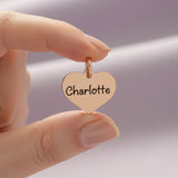 belle fever custom engraved heart keychain charm held in hand, personalized name keepsake gift full of meaning