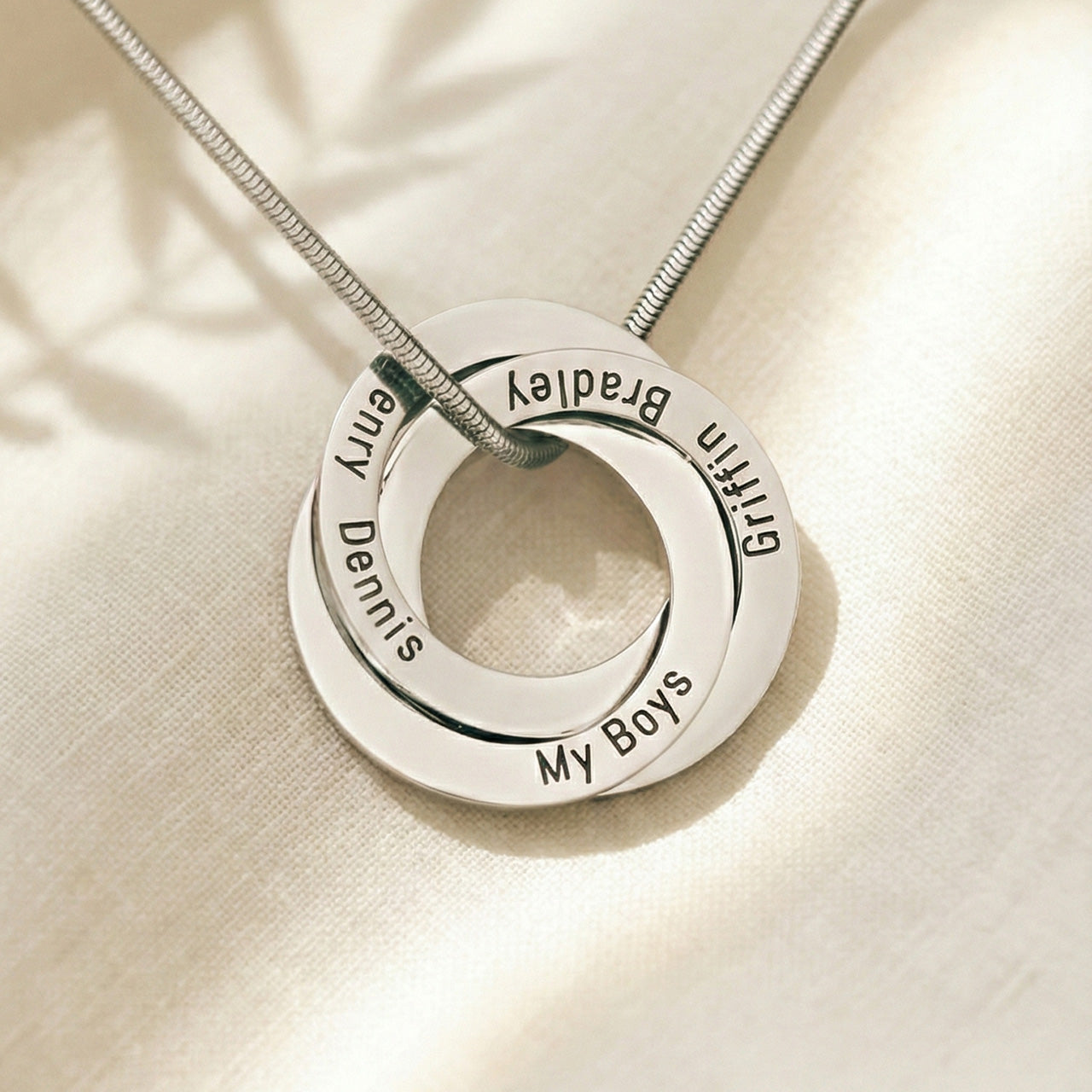 Interlinked Family Love Circles Personalised Necklace — silver engraved rings featuring family names, a timeless jewellery piece celebrating the people who matter most.