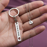 Belle Fever missing piece necklace and keychain set in hand, romantic couple jewellery, personalised anniversary keepsake, everyday meaningful gift