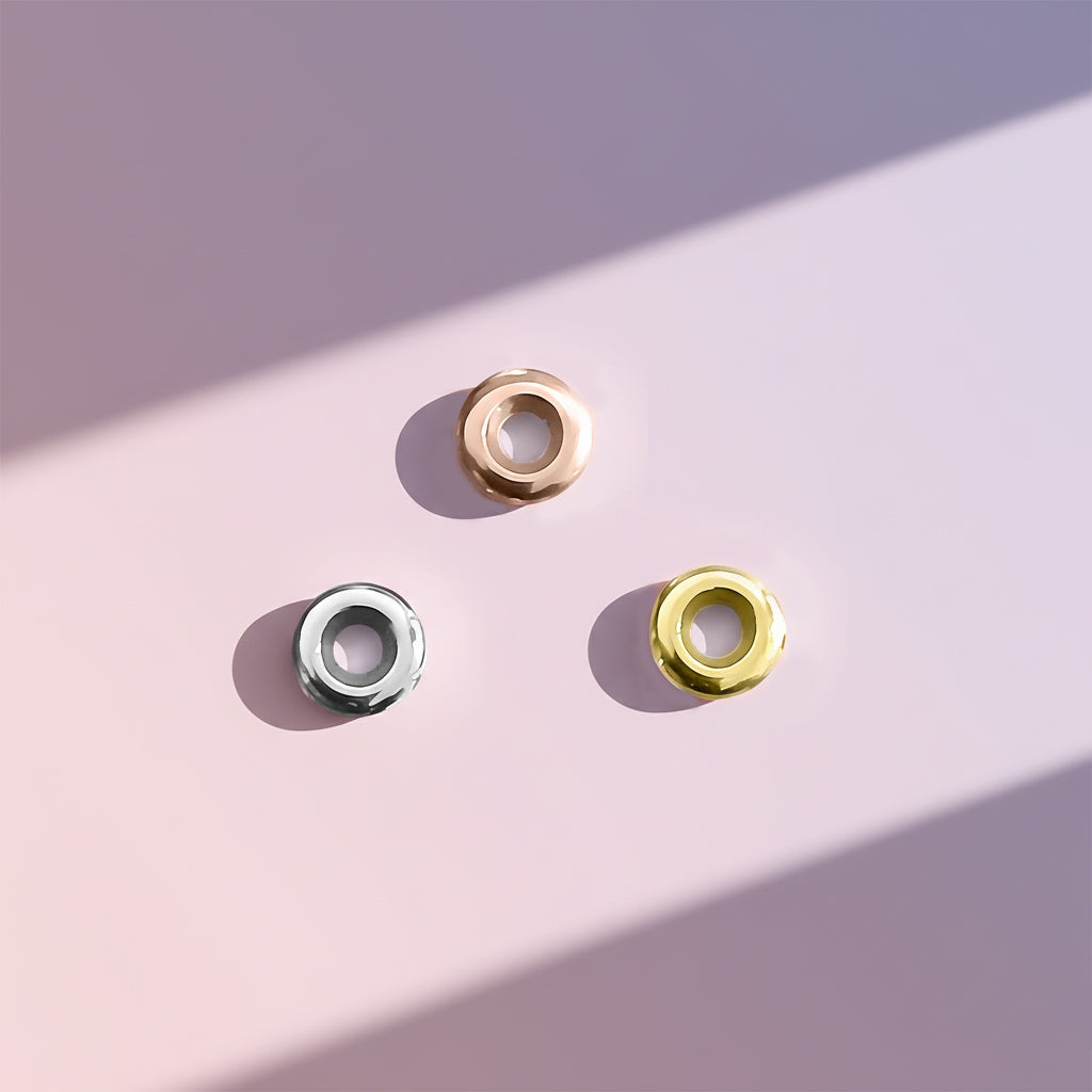 Belle Fever Stopper Beads in silver, gold, and rose gold — crafted to complement your New Moments Bracelet and add both function and style to your treasured piece.