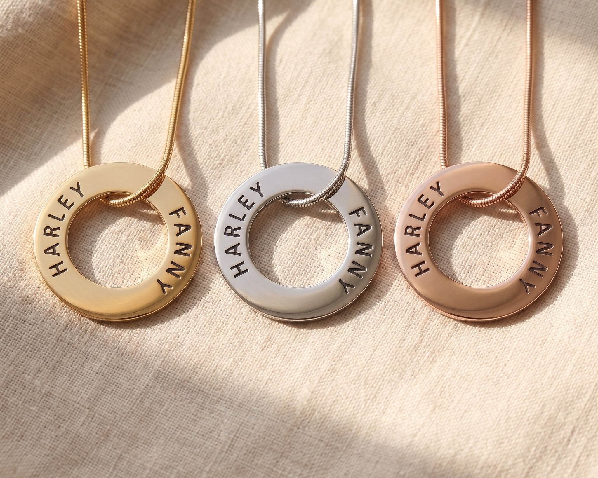 Always Forever necklace tone comparison showing gold, silver and rose gold engraved finishes
