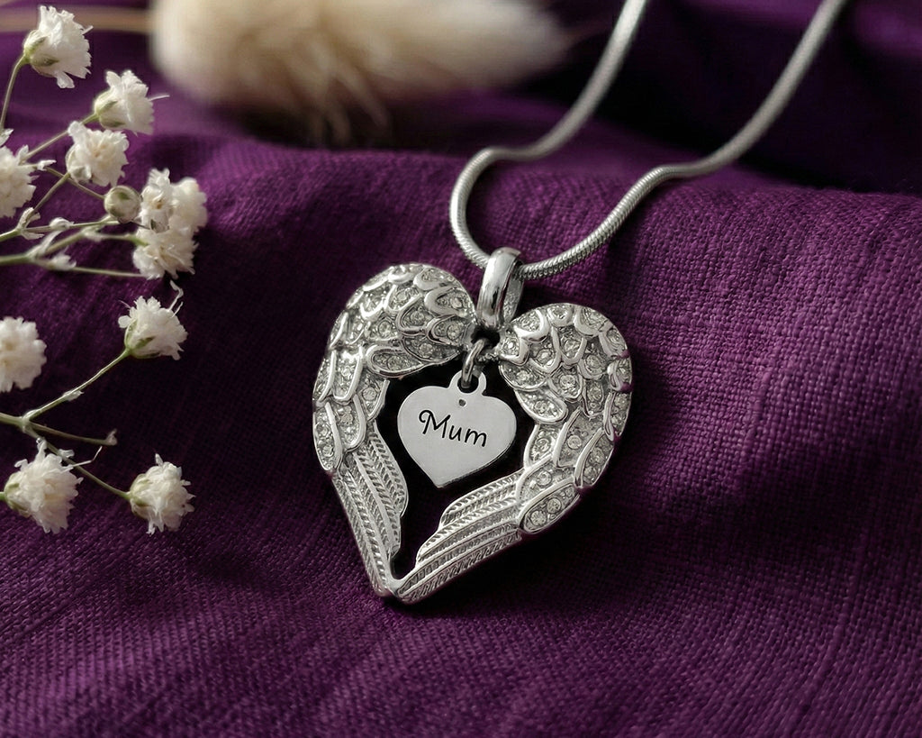 Angel Heart Necklace, silver wing pendant embracing a personalised heart charm, a touching memorial keepsake by Belle Fever jewellery