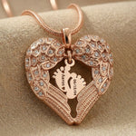 Angels Heart necklace showing baby feet design option inside heart angel wings pendant