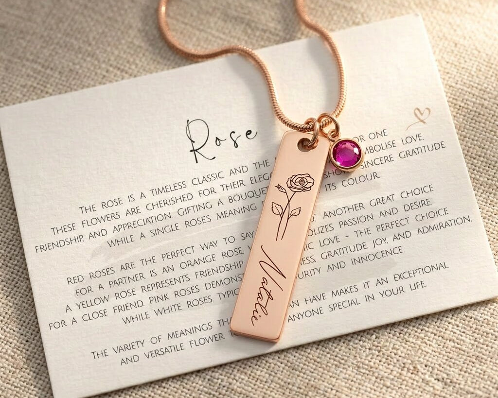 Rose gold birthflower necklace with engraved bar pendant and birthstone charm