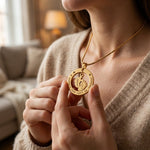 Woman wearing can't be replaced necklace with engraved message and baby feet charm, meaningful gift for mom