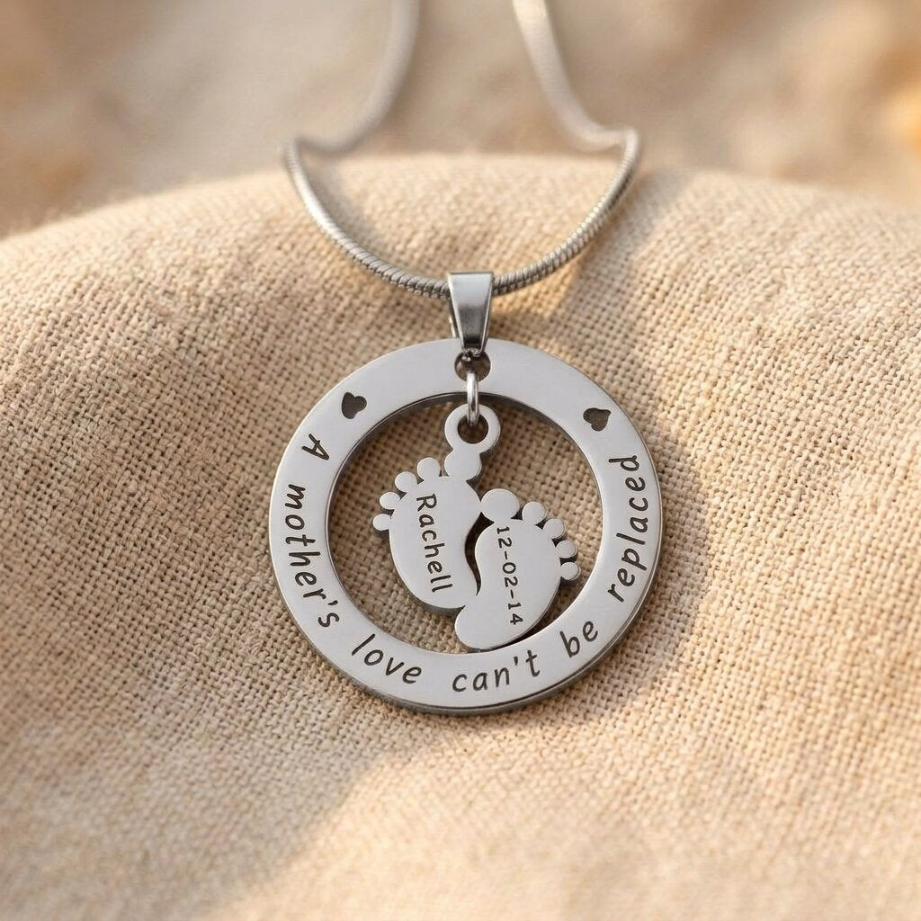 Silver Can’t Be Replaced Necklace with engraved message and baby feet charm keepsake