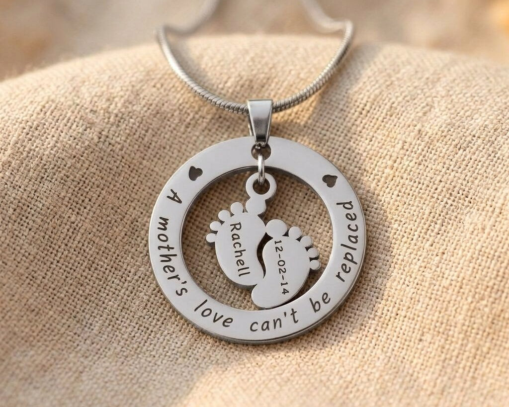 Silver Can’t Be Replaced Necklace with engraved message and baby feet charm keepsake