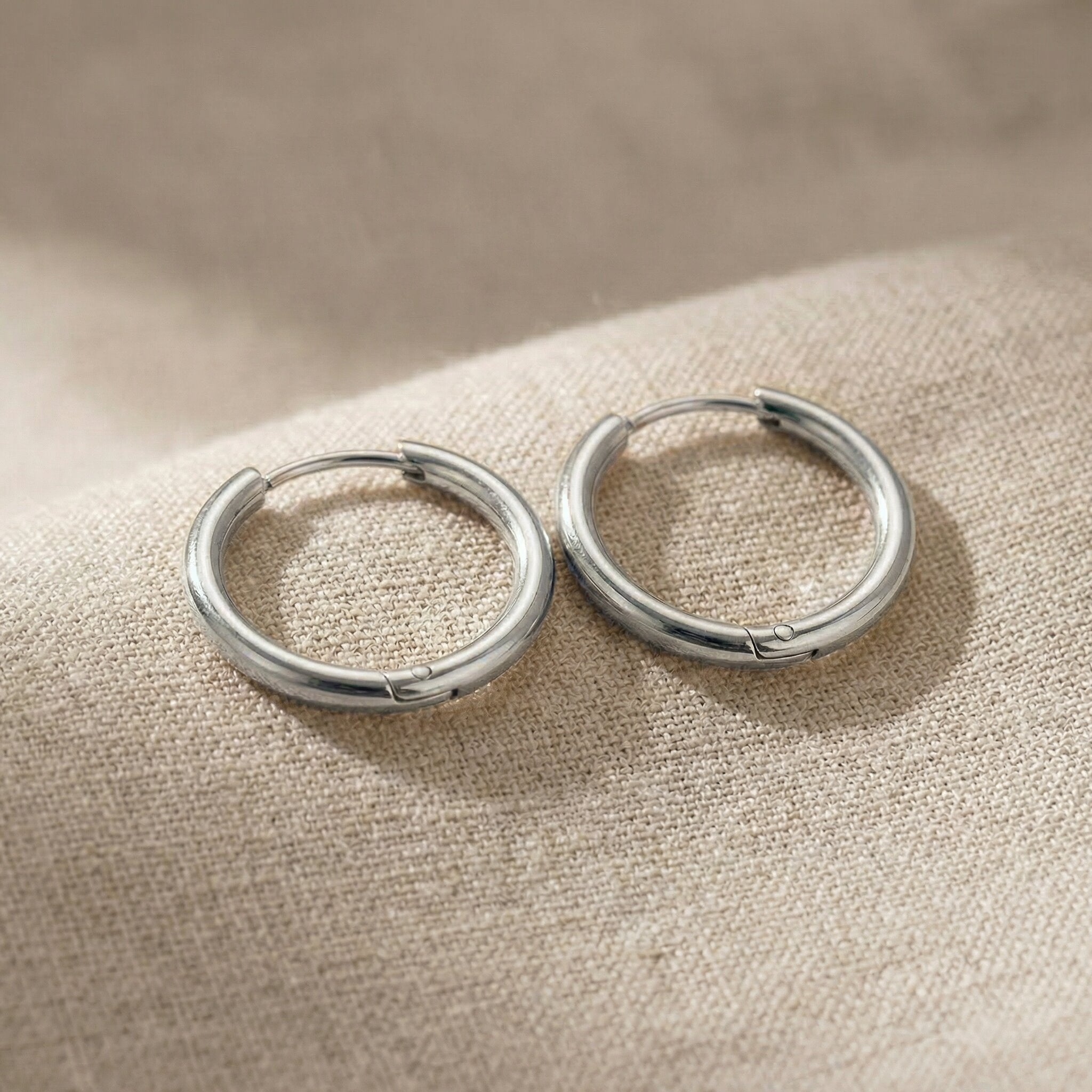 Silver chic sleeper hoop earrings with smooth polished hoop design