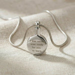 Silver circle cremation necklace with round urn pendant for memorial ashes