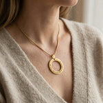 Woman wearing Circle of Trust Necklace personalized circle pendant with engraved names lifestyle image