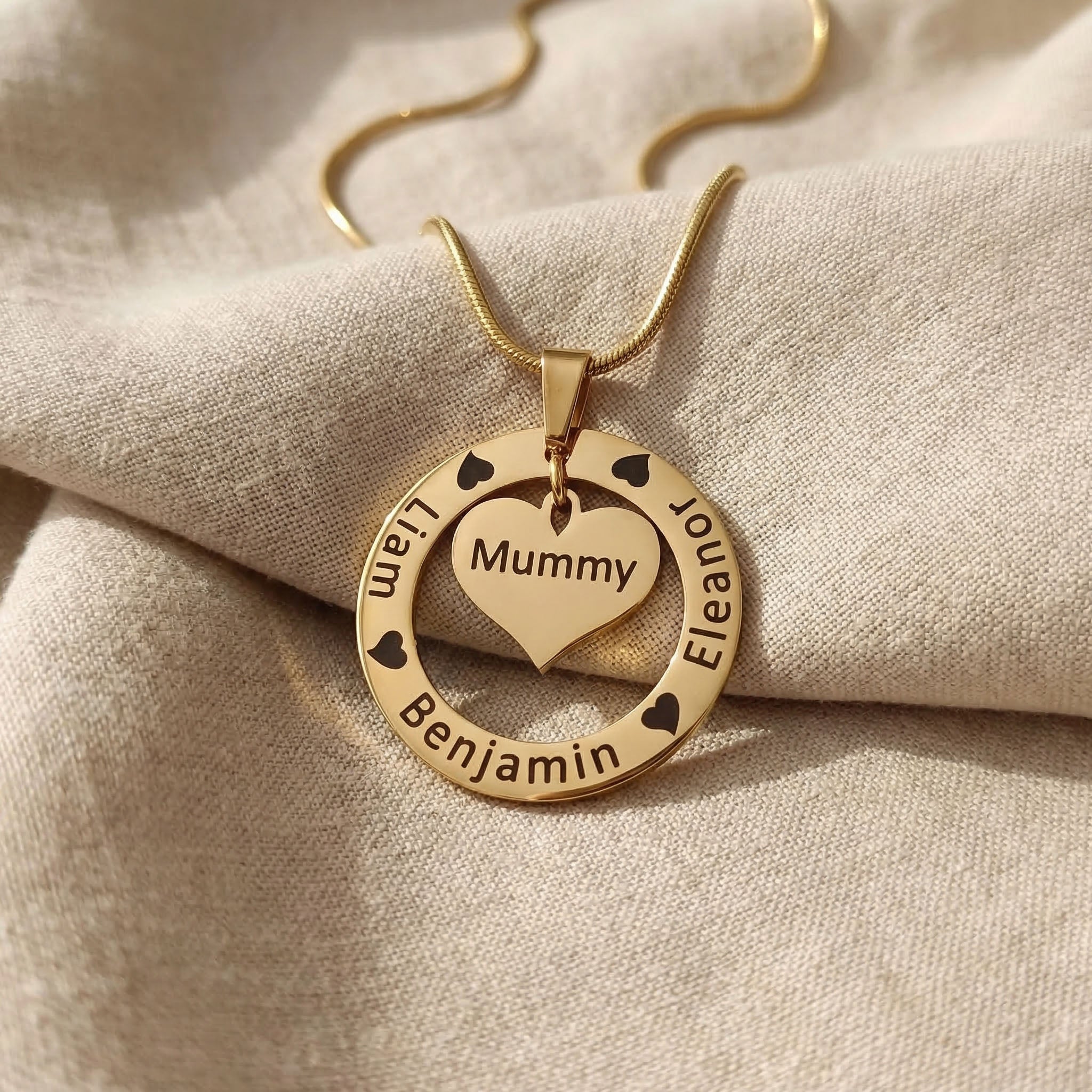 Gold Circle of Trust Necklace with engraved names and heart charm insert, elegant custom jewelry option