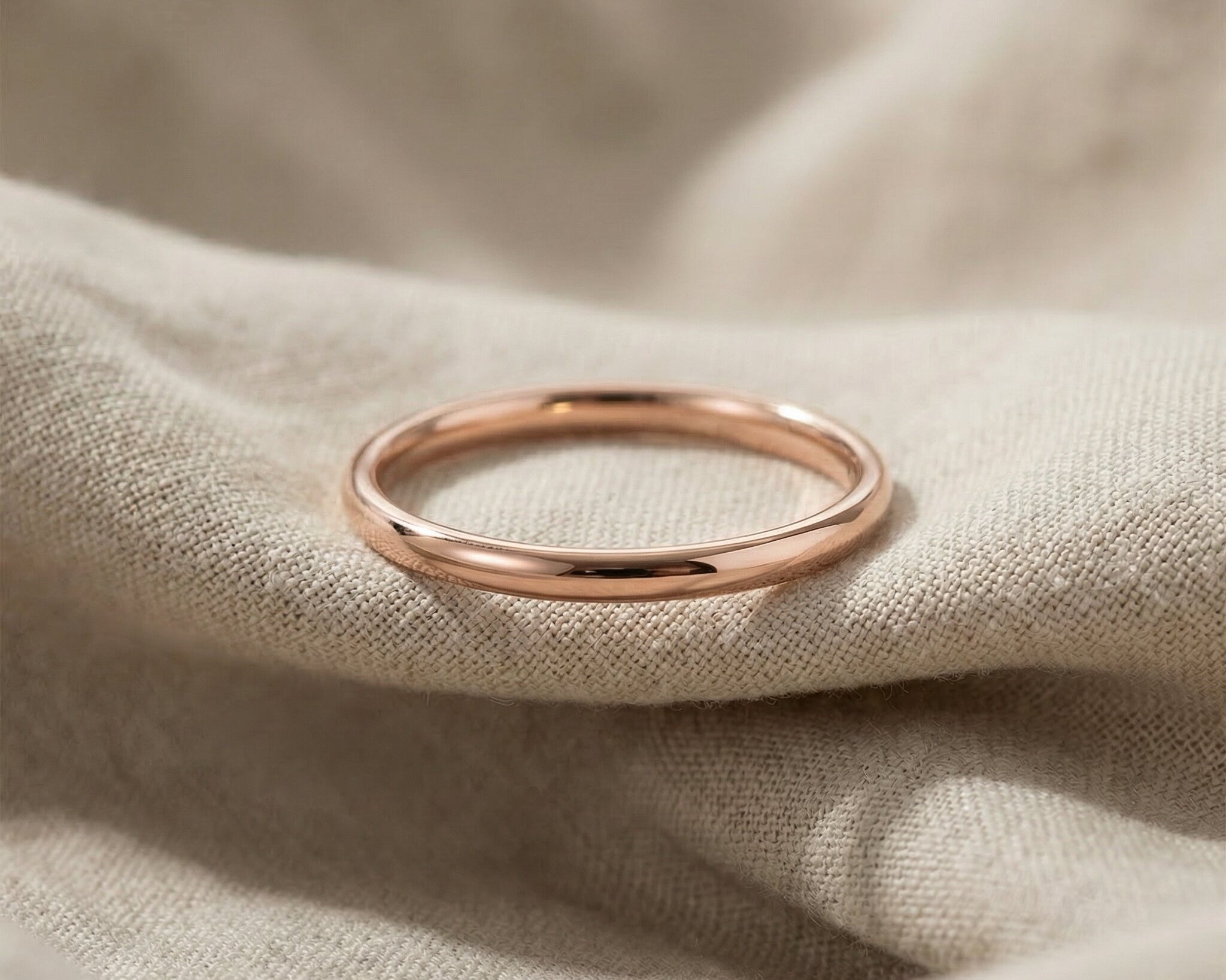 Classic band ring in rose gold with smooth polished finish, elegant minimalist jewellery