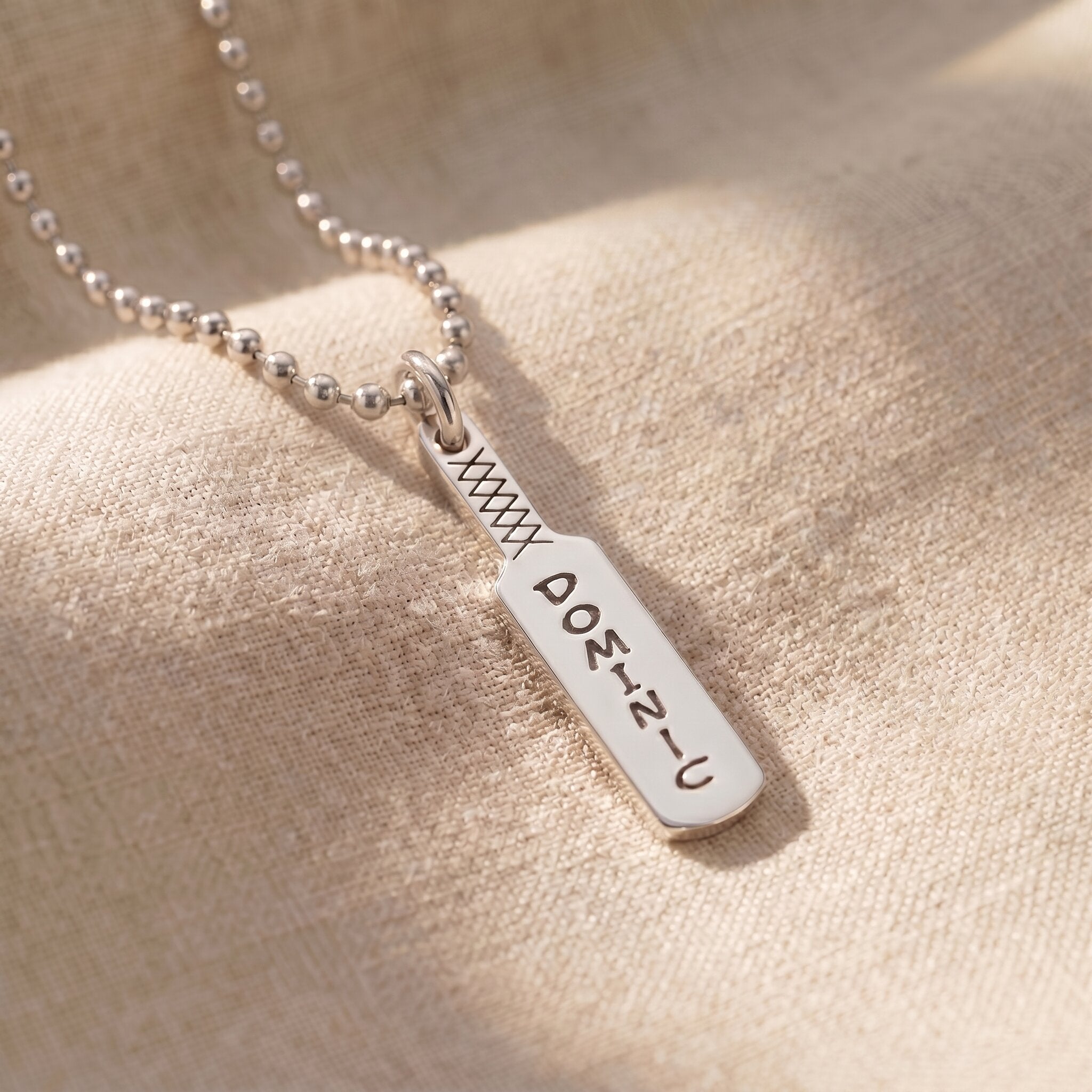 Cricket bat name necklace in silver with engraved name, personalised sporty jewellery design
