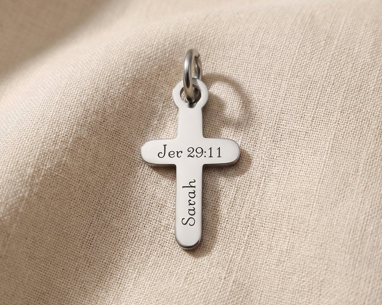 Silver cross charm for keyring symbolizing faith, spiritual connection, and meaningful religious keepsake jewelry