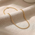Gold curb chain necklace with classic flat interlocking link design