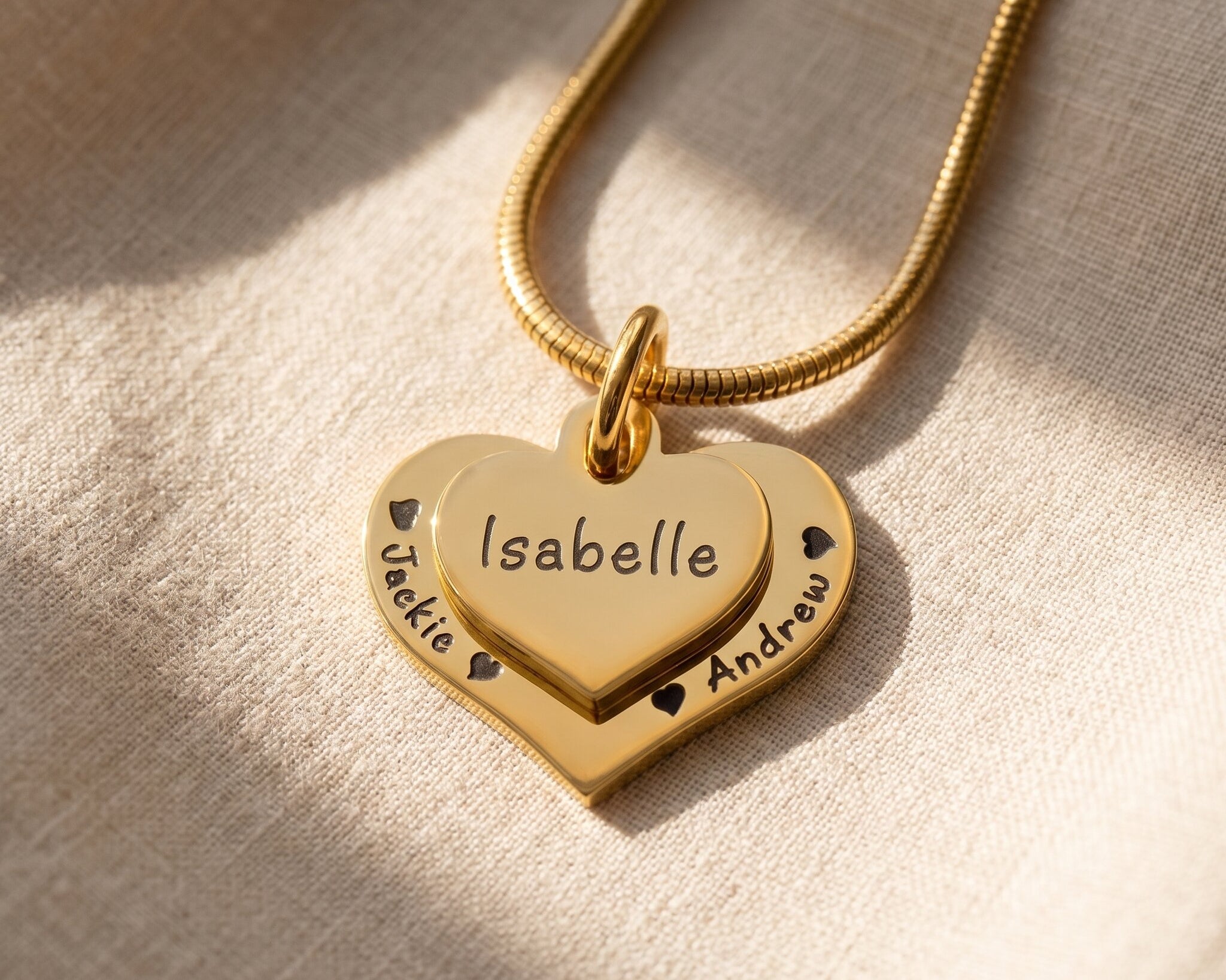 Double heart necklace in gold with personalised name engraving, meaningful love keepsake jewellery gift