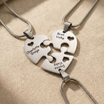 Heart Puzzle Necklace with three engraved pieces forming complete heart pendant design