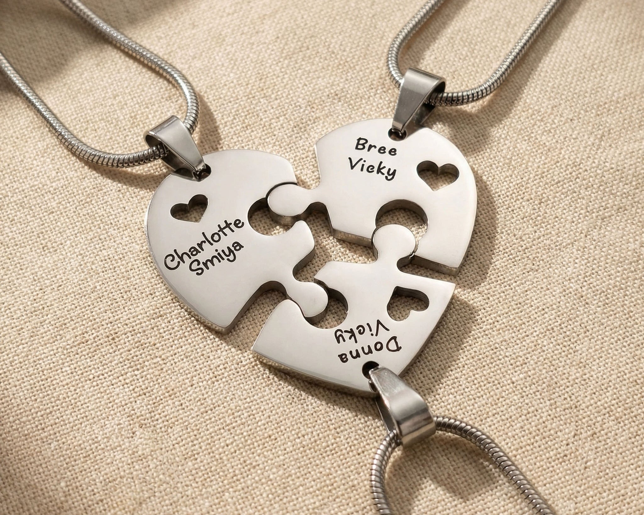 Heart Puzzle Necklace with three engraved pieces forming complete heart pendant design