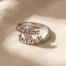 Personalized double name silver ring with custom script design and polished minimalist jewelry finish