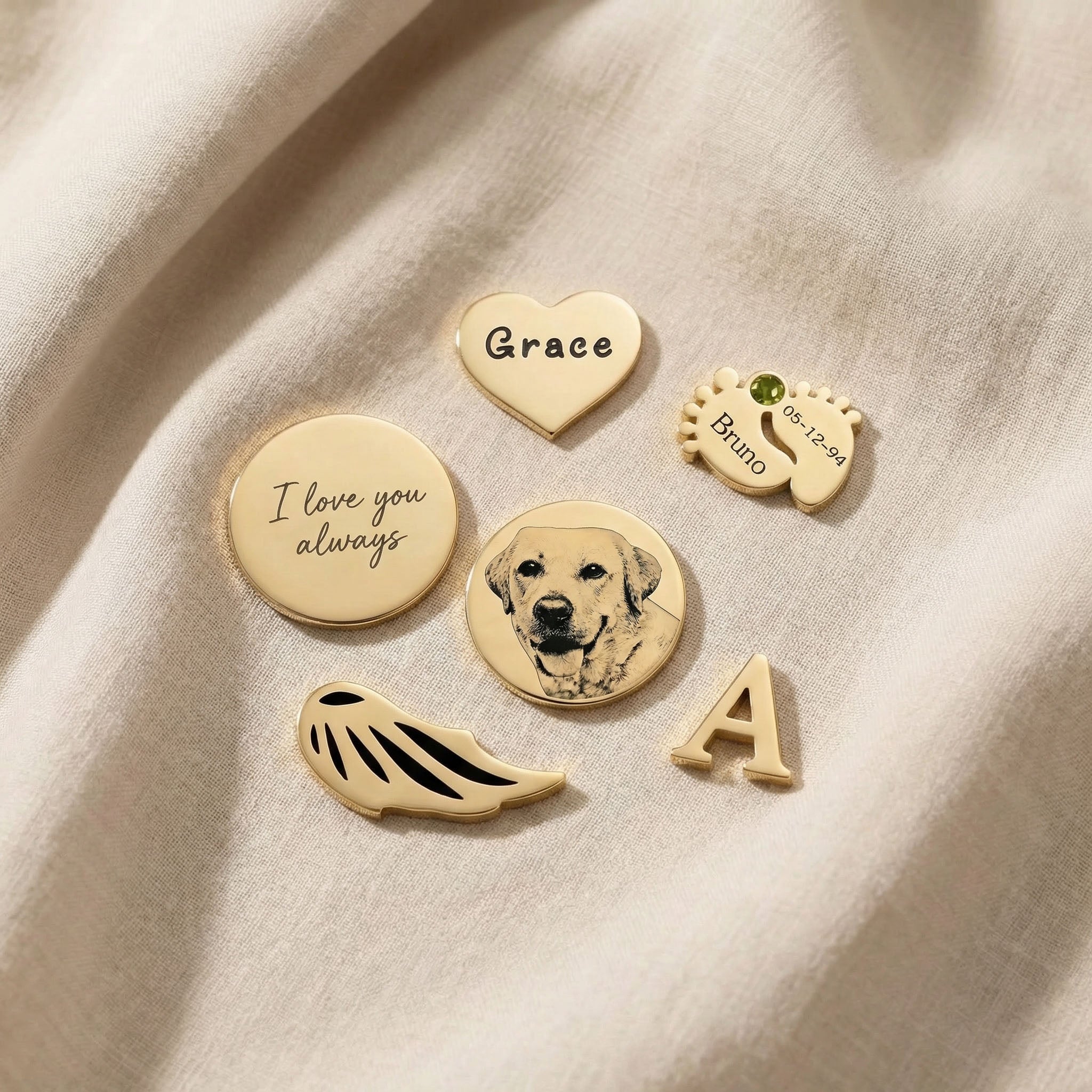 Dream locket charms in gold showing personalised inserts, initial charm, pet photo and engraved message options