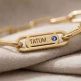 Close-up of Endless Ties Bracelet showing engraved name on link with fine detail and polished finish