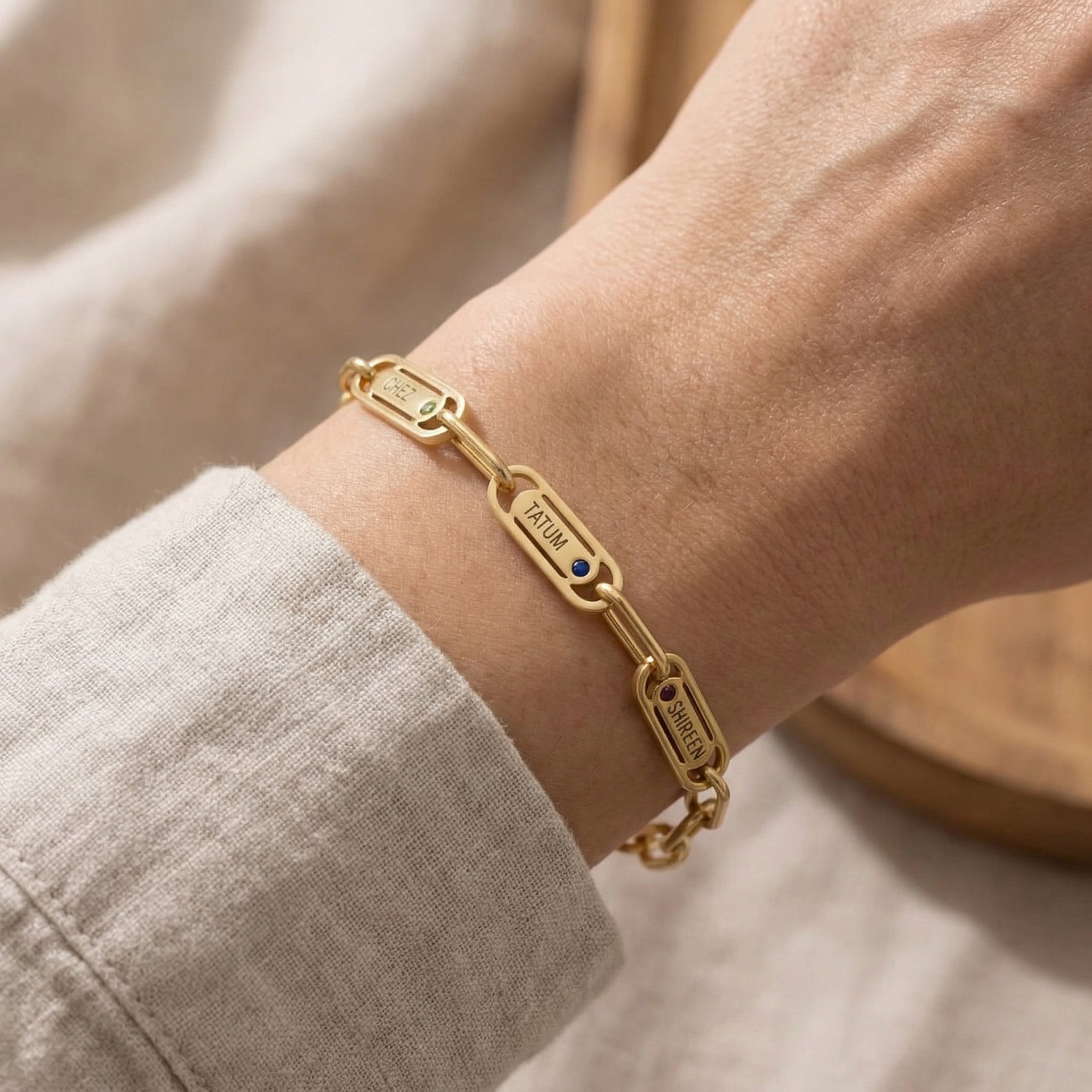 Woman wearing Endless Ties Bracelet with engraved name, personalized link bracelet lifestyle image