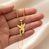 Fairy Name Necklace by Belle Fever — gold fairy pendant displayed in hand, a charming personalised keepsake necklace designed for children who love magic and fairytales.