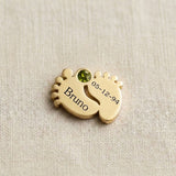 Gold baby feet birthstone charm for Dream Locket bracelet celebrating newborn milestones and family memories