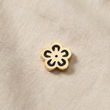 Gold flower charm for Dream Locket bracelet symbolizing beauty, growth, and meaningful life moments