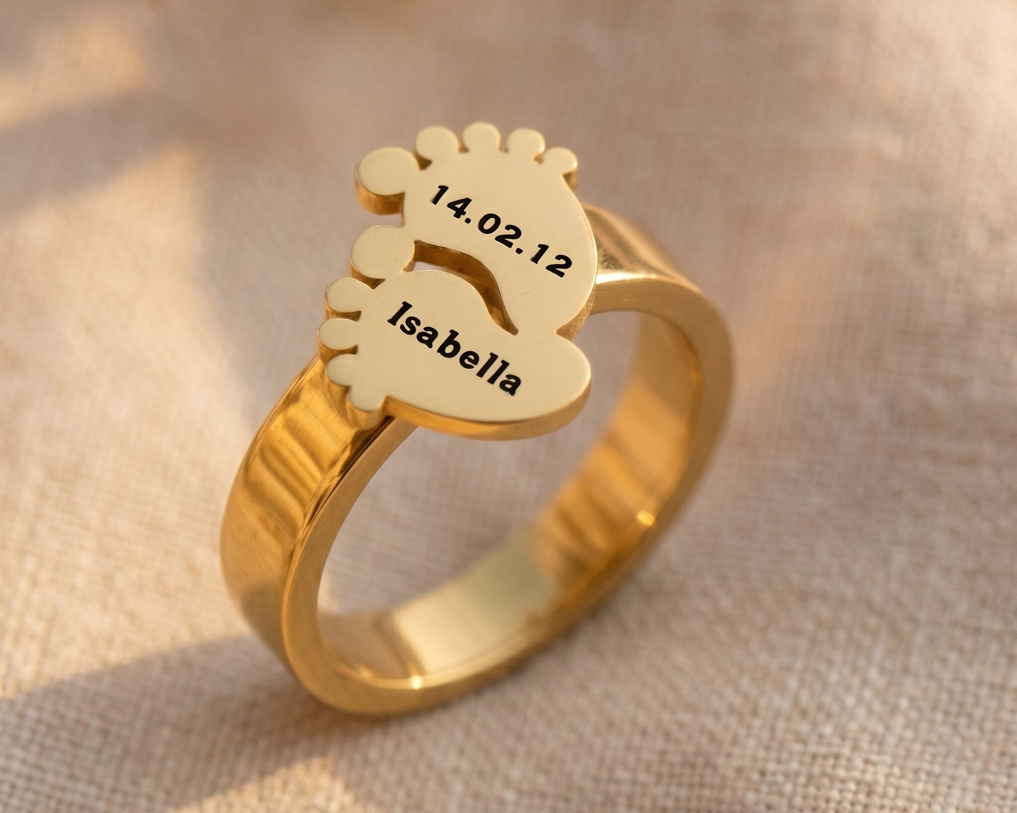 Footprint ring in gold with engraved baby name, meaningful mother jewellery gift