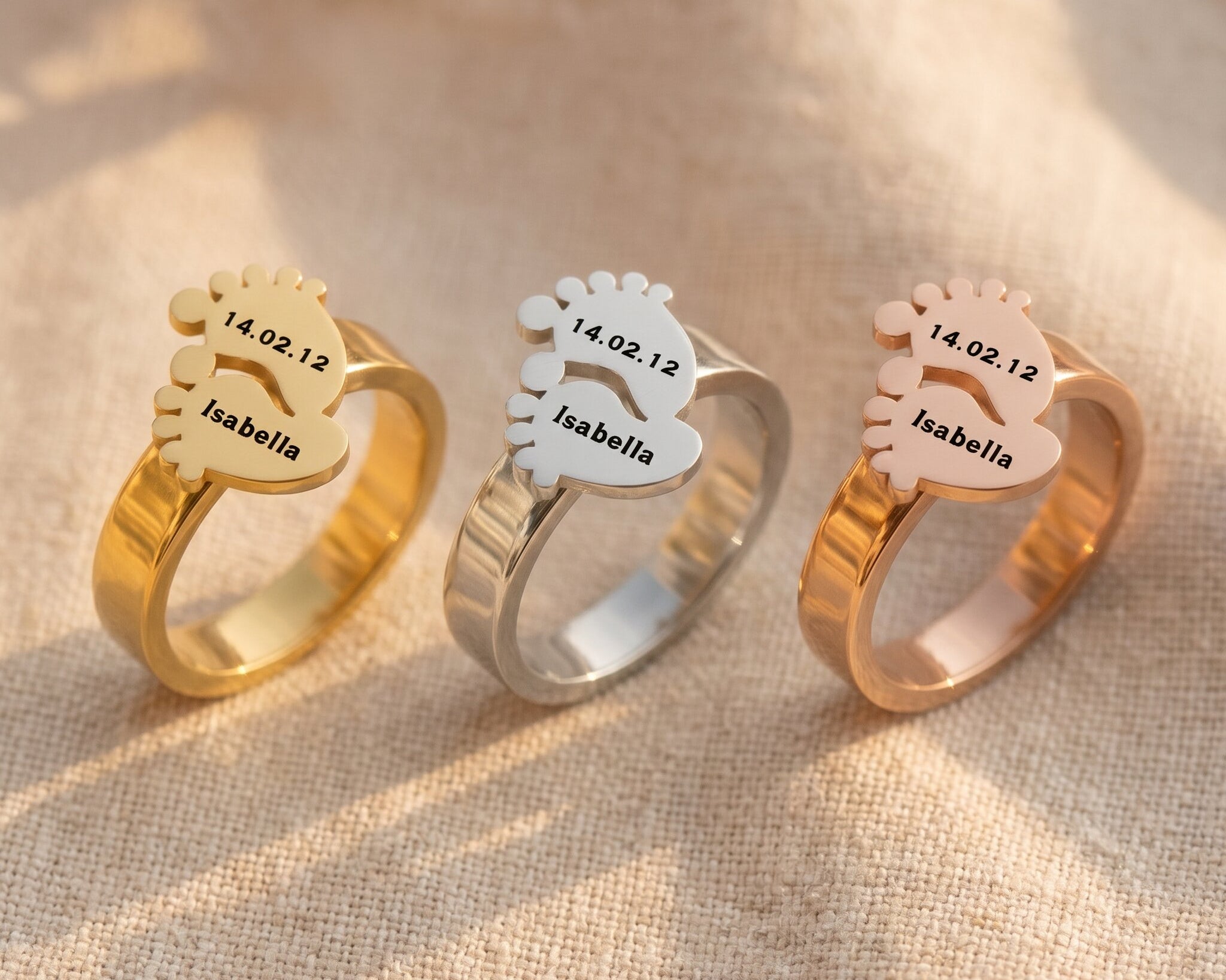 Footprint ring tone comparison showing gold, silver and rose gold finishes, personalised mother keepsake gift