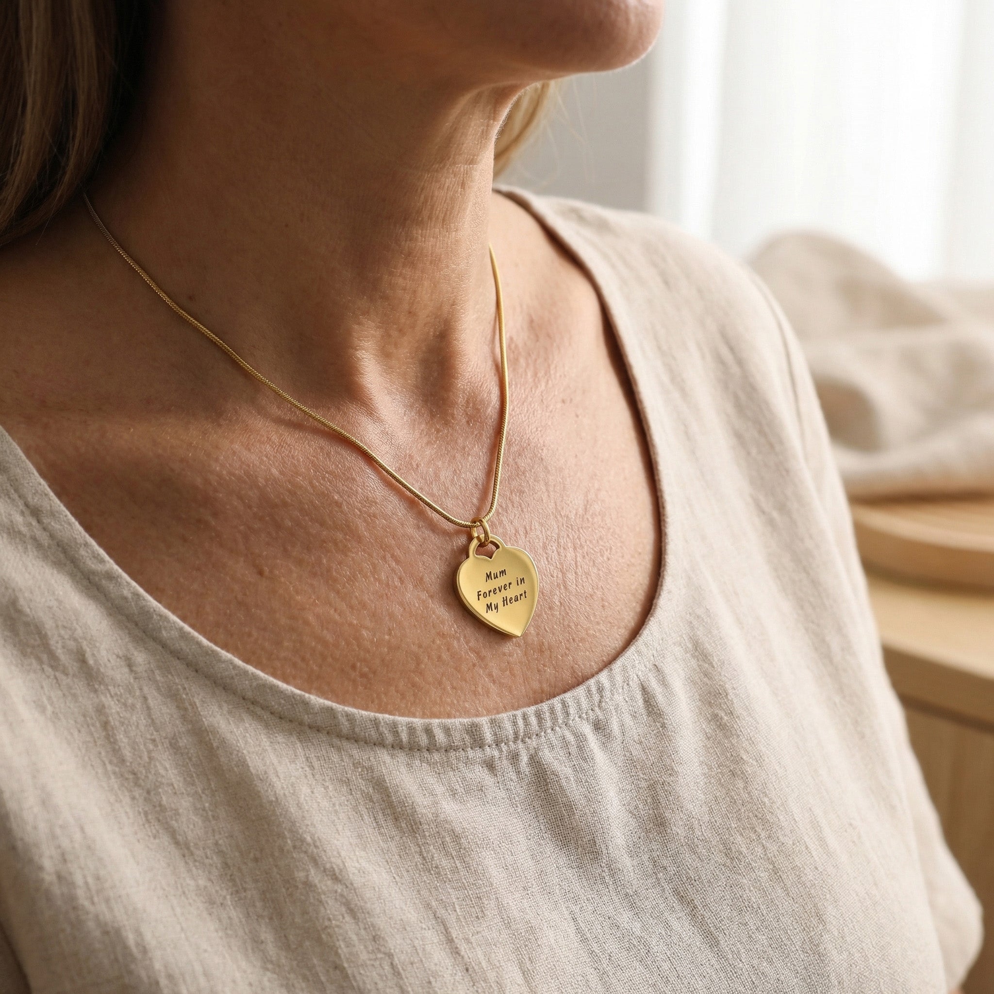 Woman wearing Forever In My Heart Necklace with heart pendant, personalised jewellery lifestyle image