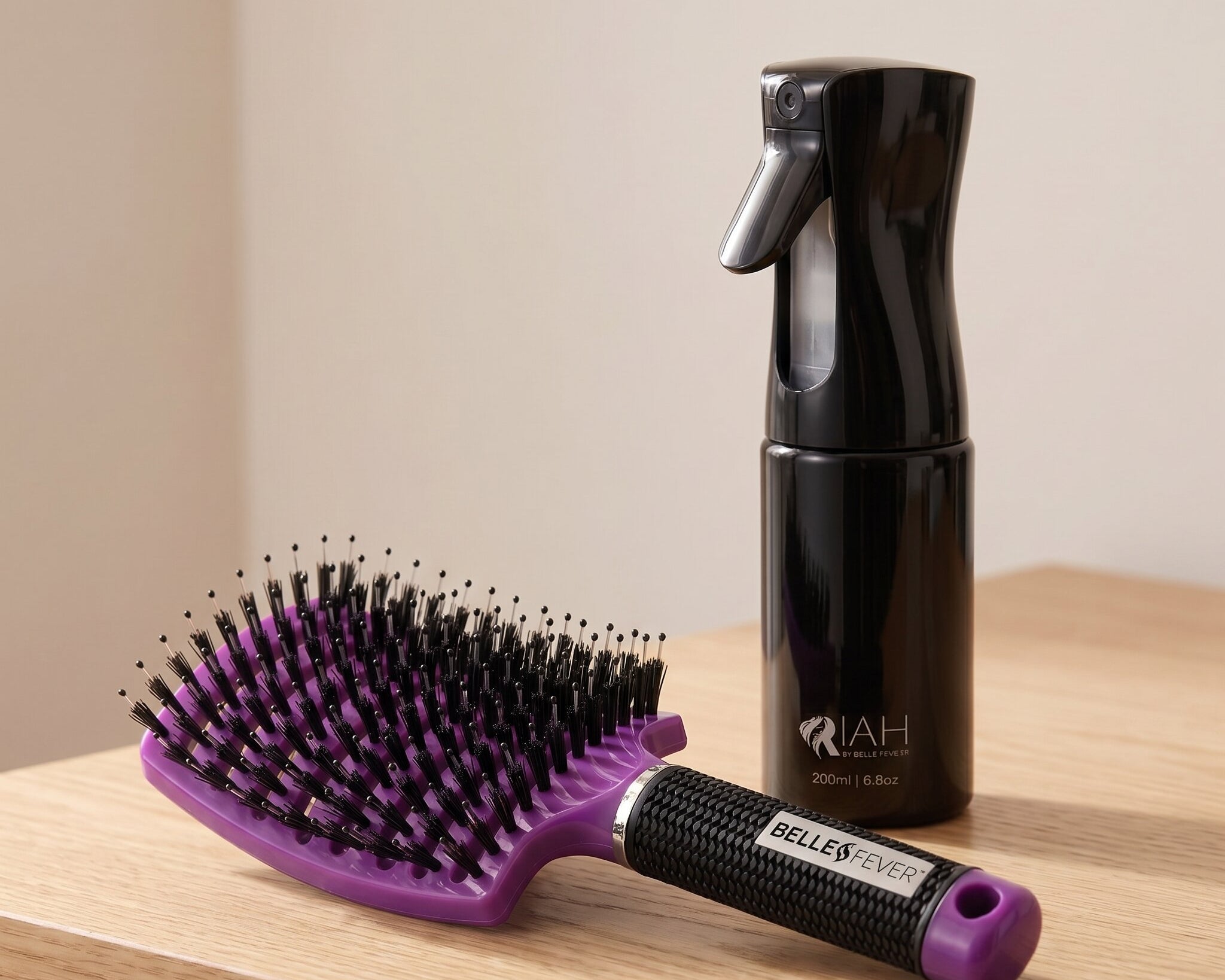 Hair care set with detangling hair brush and continuous mist spray bottle for easy brushing and styling