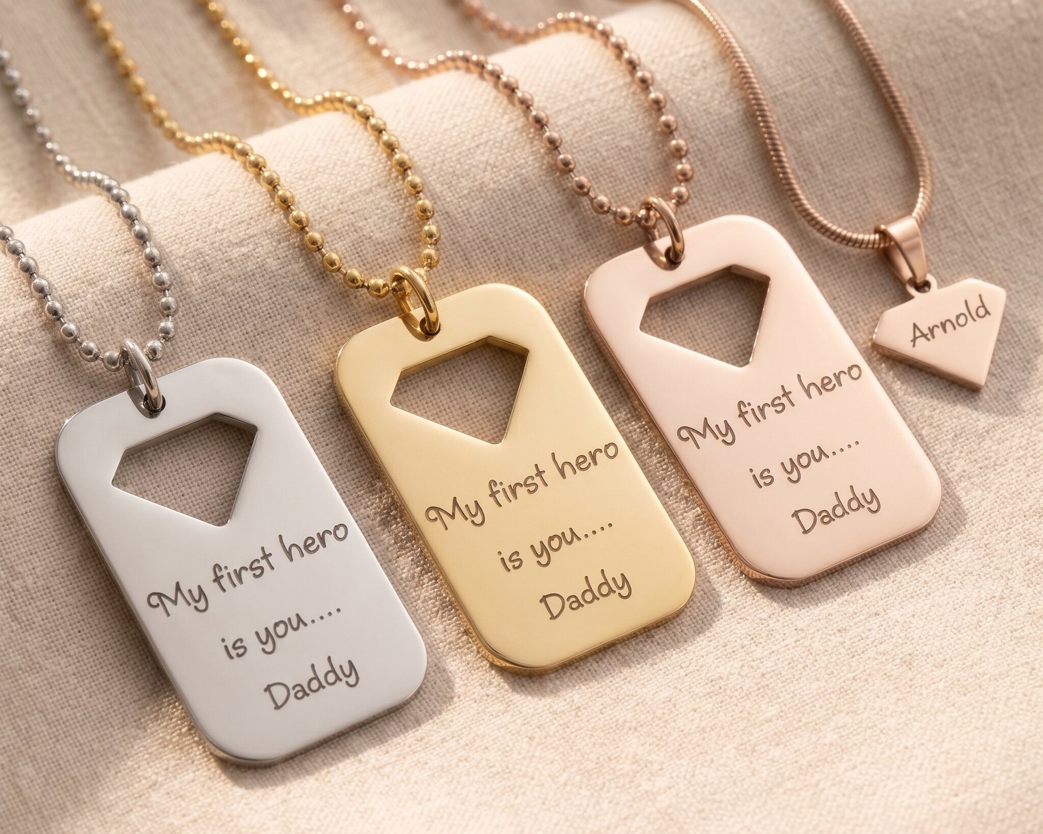 Personalised dog tag necklace tone comparison showing gold, silver and rose gold engraved finishes