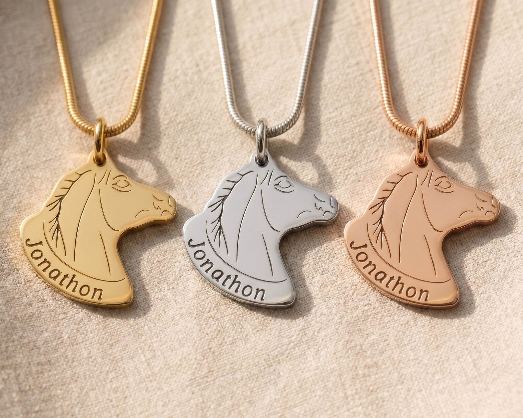 Horse head name necklace tone comparison showing gold, silver and rose gold finishes