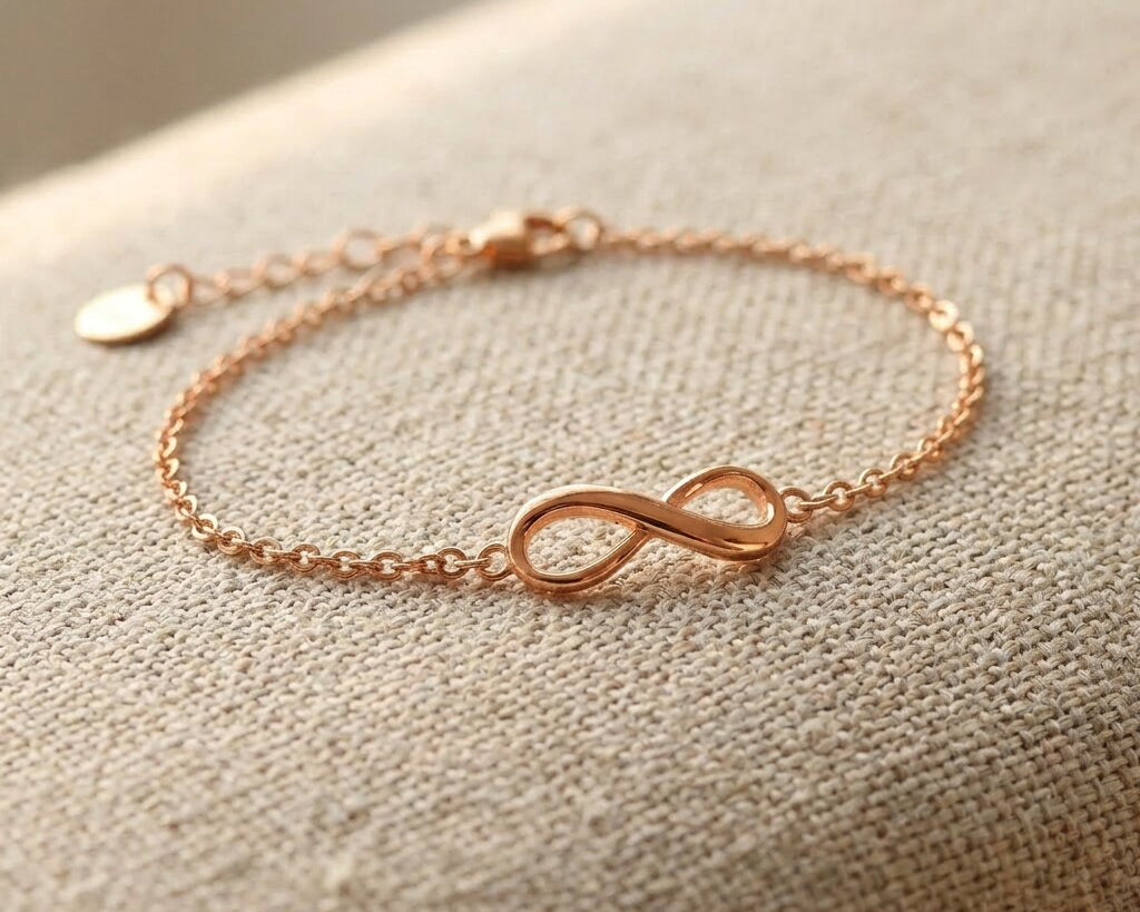 Rose gold infinity bracelet with delicate chain and infinity symbol design