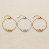 Infinity bracelet in gold silver and rose gold finishes with delicate chain design