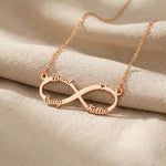 Rose gold infinity name necklace with custom name on infinity pendant design