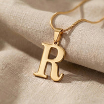 Initial Necklace in gold with letter pendant, personalised jewellery hero image