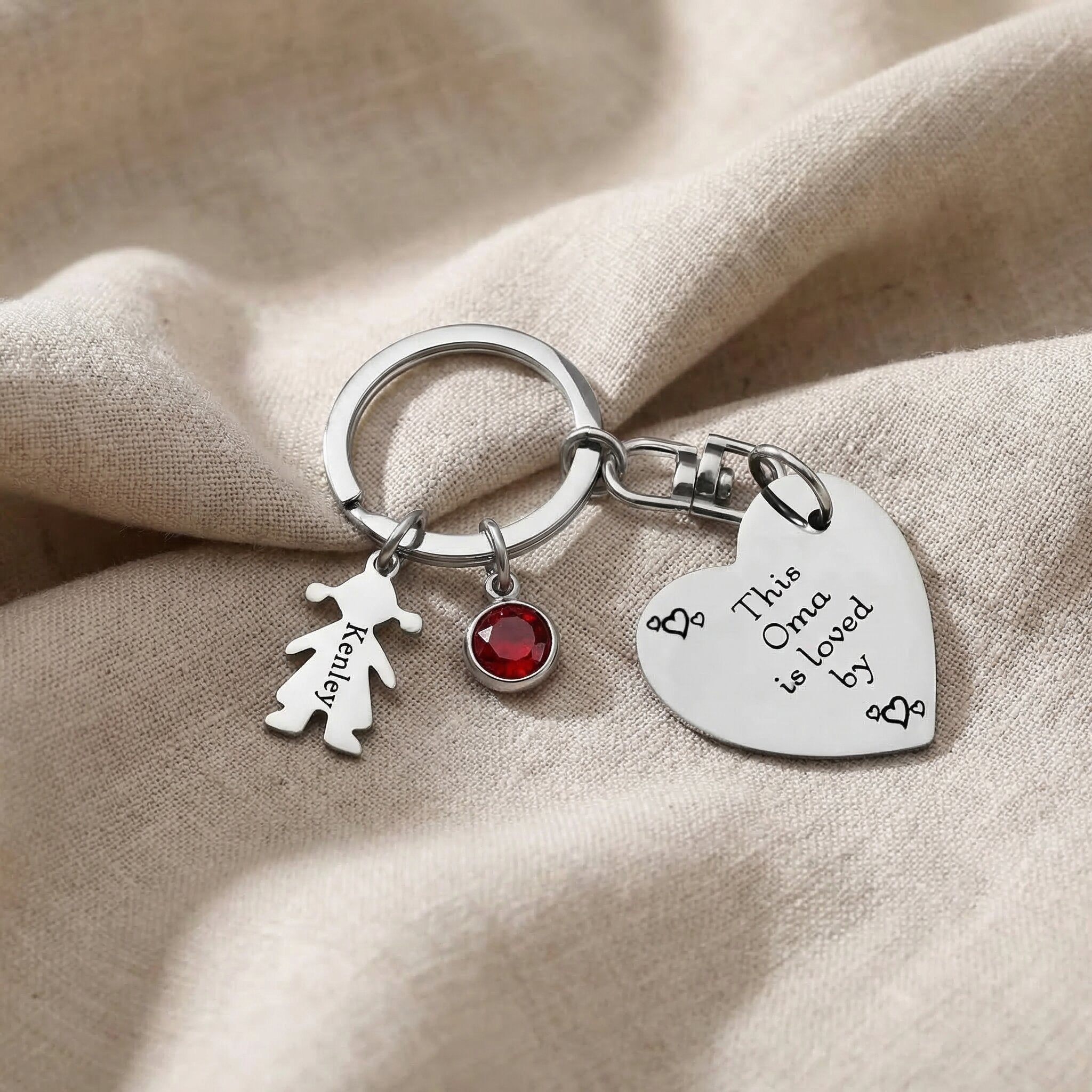 Kids Love Heart Keyring in silver with engraved heart disc and child charm, personalised keepsake
