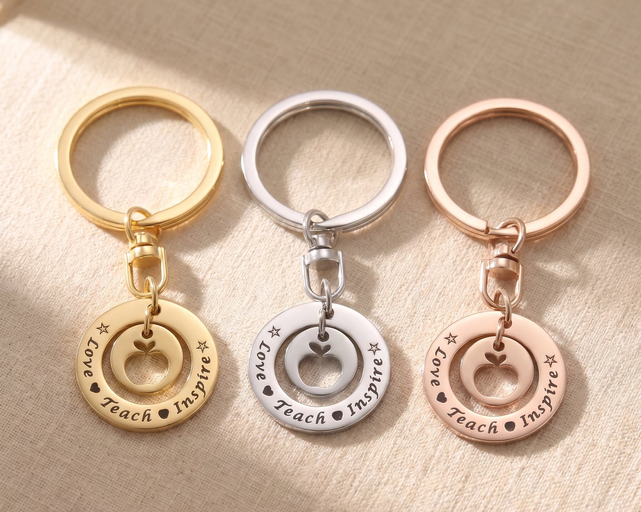 Love teach inspire keyring tone comparison showing gold, silver and rose gold gift options