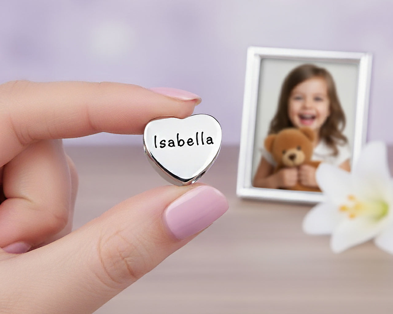 Personalised love Heart Charm – silver heart bead engraved with the name ‘Isabella’. A sentimental Belle Fever charm celebrating love & family 